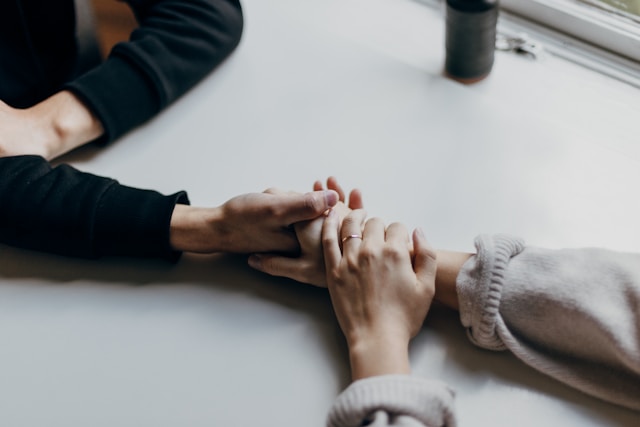 marriedd couple holding hands, marriage counseling